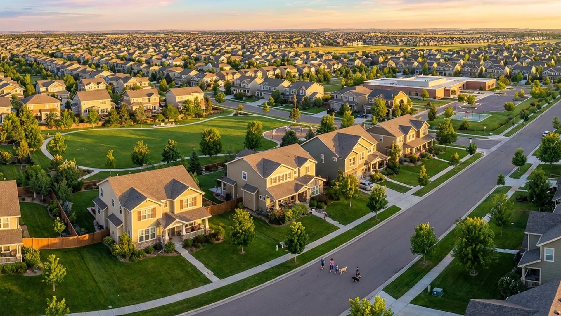 Homes along tree-lined streets seen from above